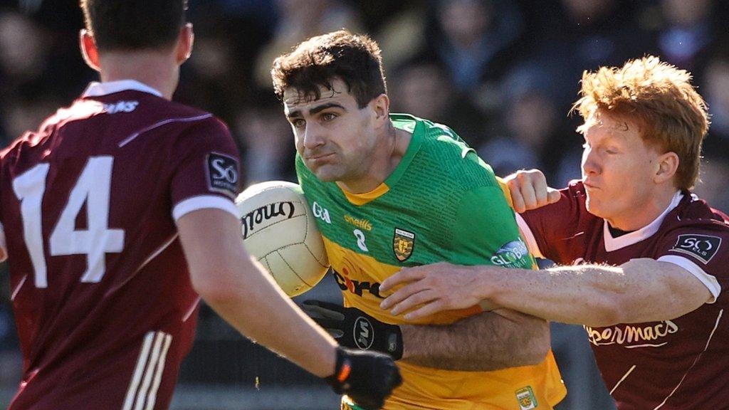 Donegal midfielder Caolan McGonigle battles for possession against Galway