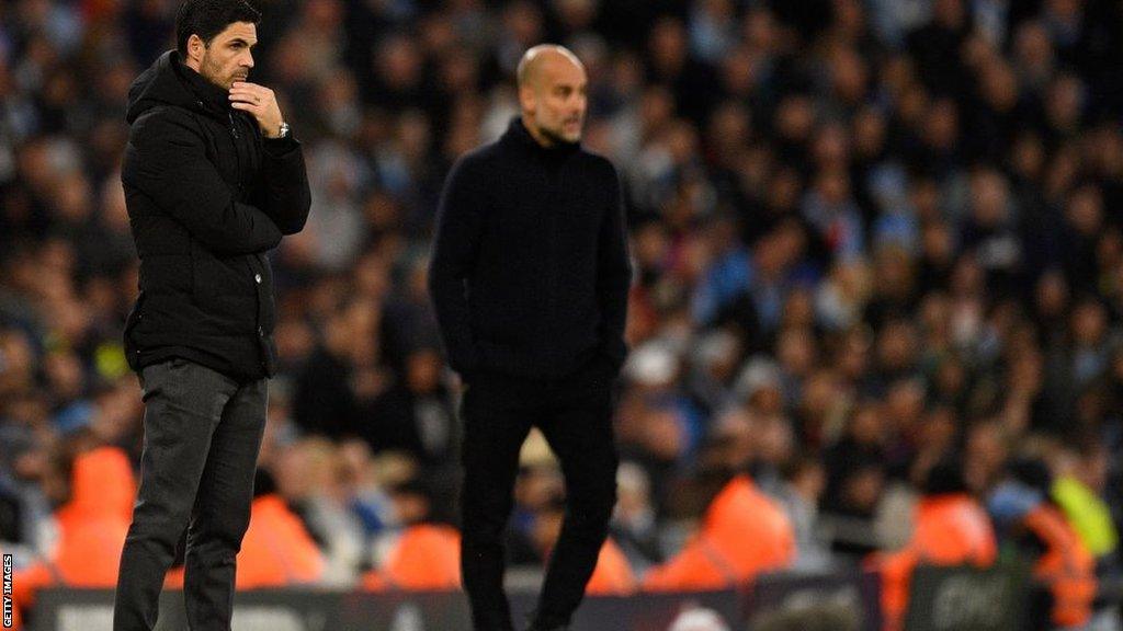 Arsenal boss Mikel Arteta looks on alongside Manchester City manager Pep Guardiola