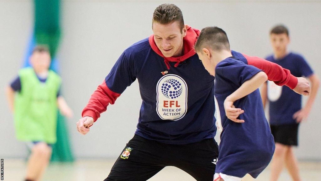 Wrexham player Paul Mullin at a session with children with autism