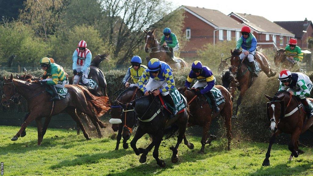 Roi Mage ridden by Felix de Giles, Corach Rambler ridden by Derek Fox and Our Power ridden by Sam Twiston-Davies in action during the Grand National