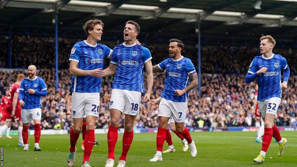 Portsmouth celebrate scoring a goal