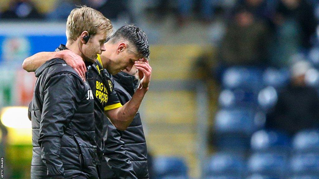 Martin Kelly came off during the 75th minute of Wigan Athletic's goalless draw with Blackburn Rovers on Monday