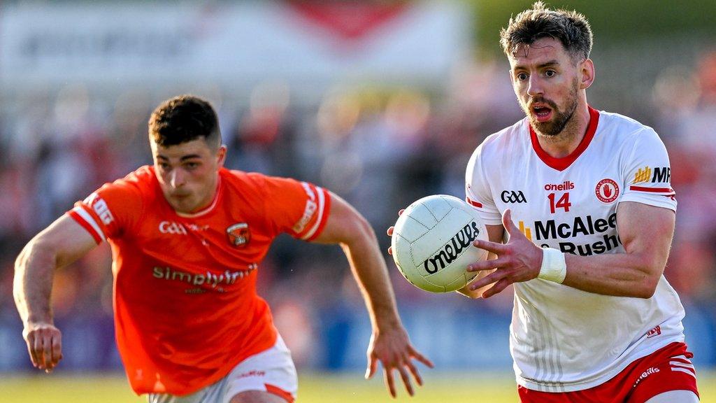 Mattie Donnelly tries to burst away from Armagh's Conor O'Neill in the contest at Healy Park earlier this month