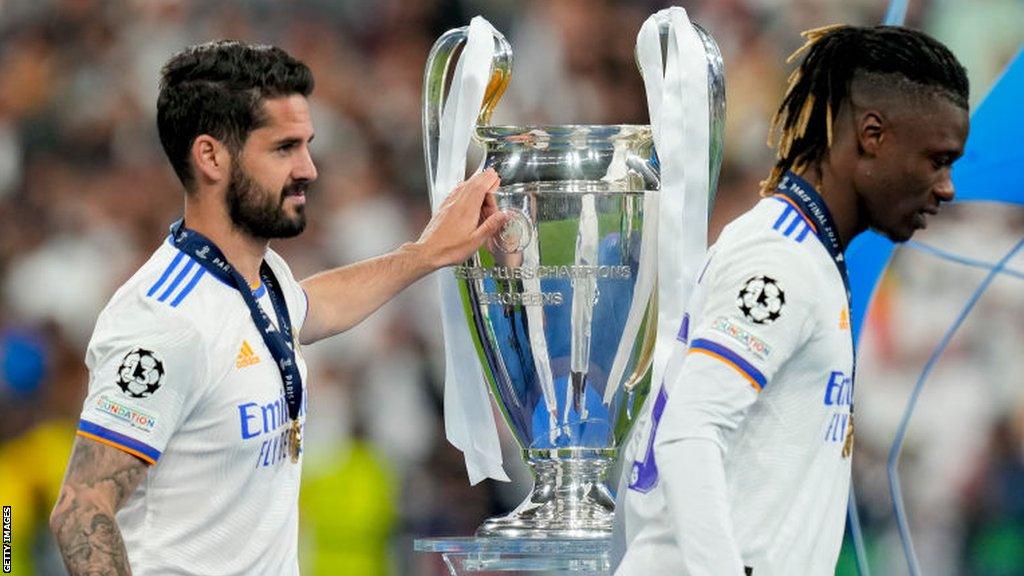 Isco and Eduardo Camavinga with the Champions League trophy after Real Madrid won the 2022 final