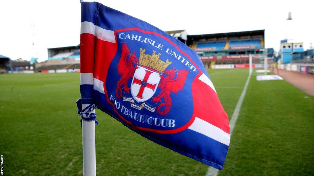 Carlisle badge on a corner flag at Brunton Park