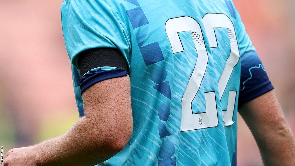 Paige Culver of London City Lionesses wearing a black armband