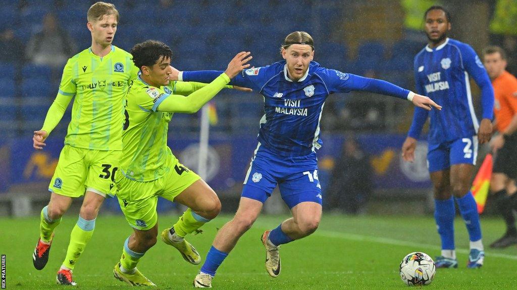 Ben Chrisene (45) of Blackburn Rovers battles for possession with Josh Bowler (14) of Cardiff City