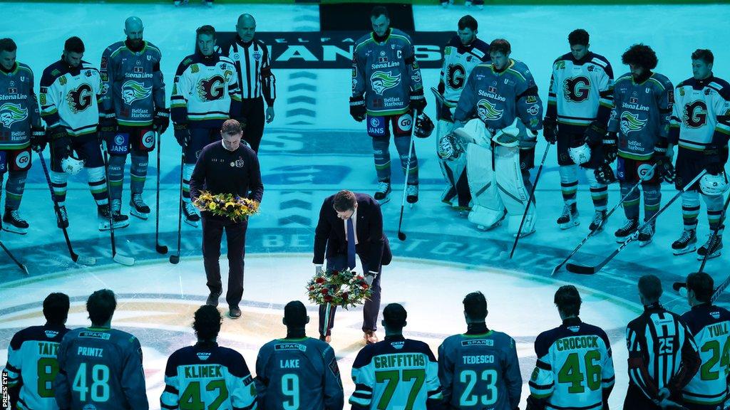 Belfast Giants coach Adam Keefe and Guildford Flames coach Paul Dixon lay wreaths on the ice prior to last Saturday's game at the SSE Arena