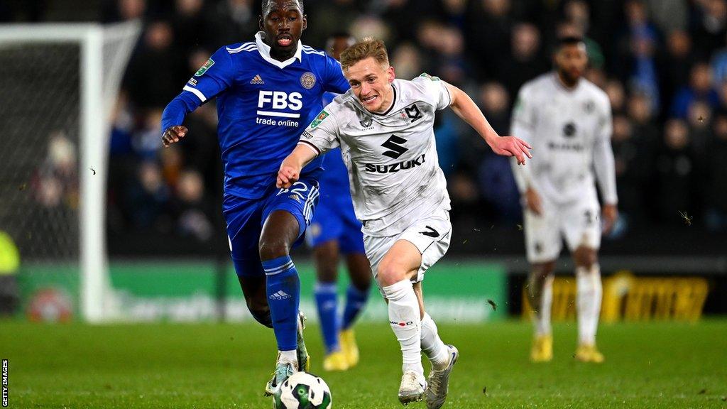 Matt Smith (right) in action for MK Dons