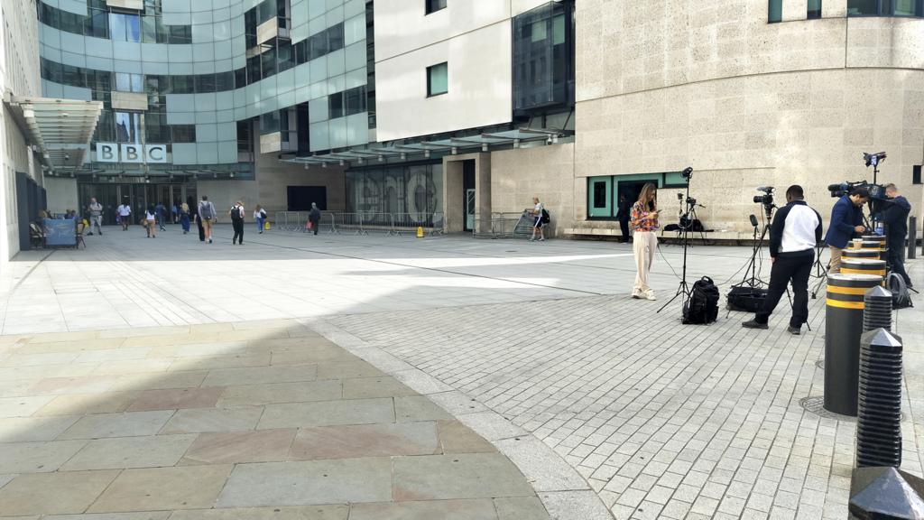 Reporters outside BBC Broadcasting House in London