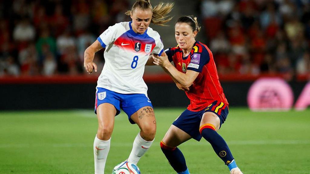 Georgia Stanway and Ona Batlle tussle for possession