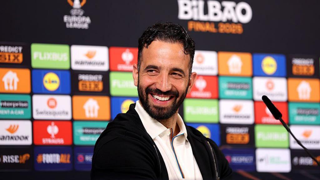 Ruben Amorim laughing during news conference