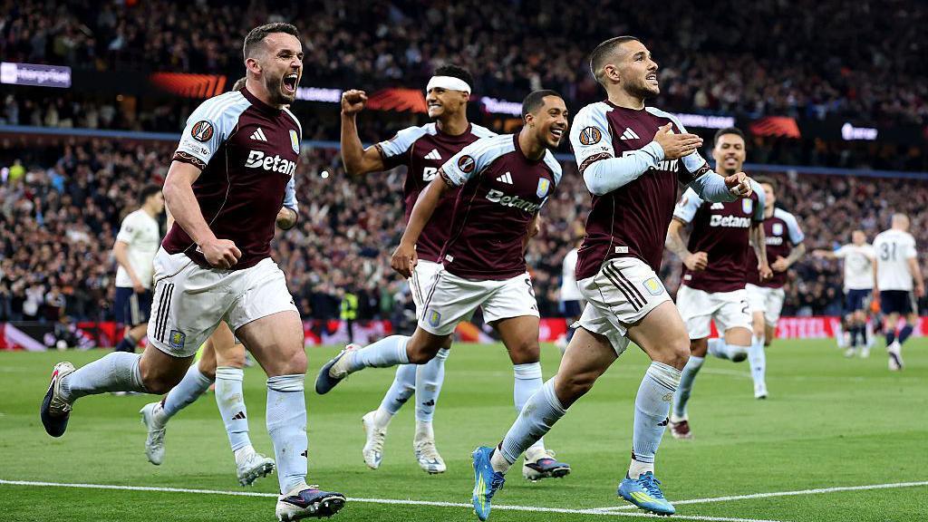 Aston Villa players celebrate