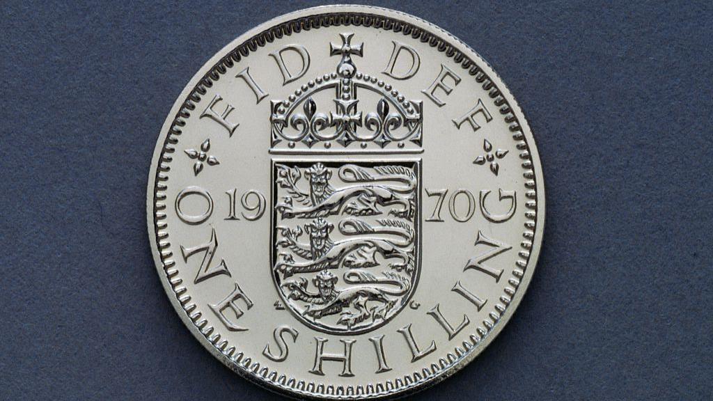 A silver one shilling coin from 1970