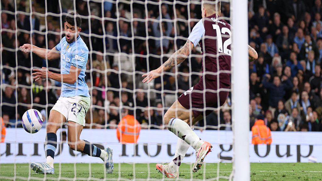 Matheus Nunes squeezes Manchester City's winner home in the 94th minute