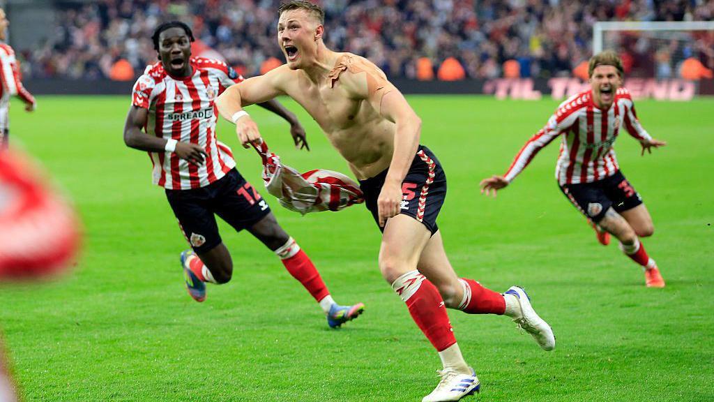 Dan Ballard's goal in the semi-final of the Championship playoffs. He's taken his shirt off in celebration and runs to celebrate with the fans at the Stadium of Light.
