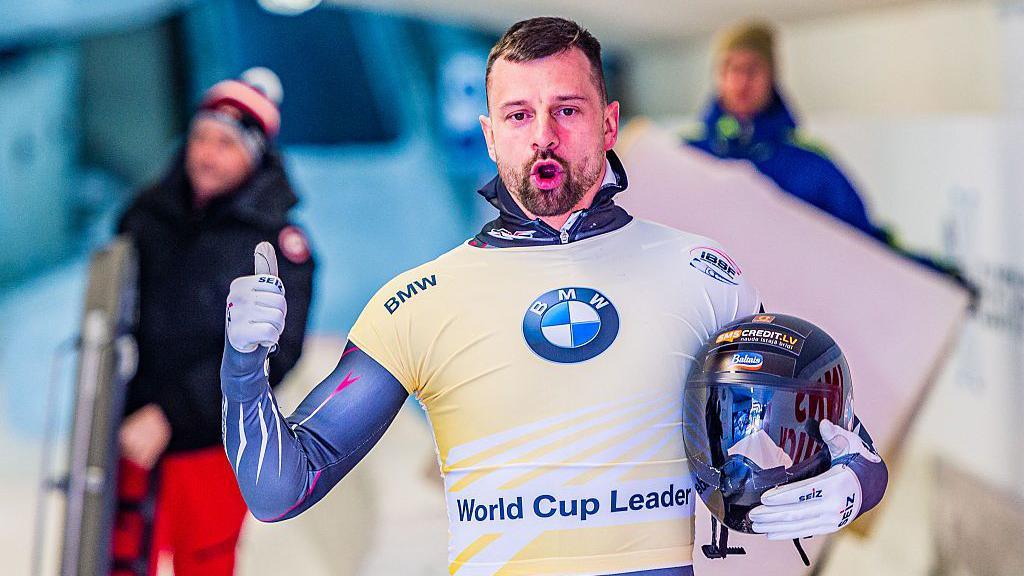 Martins Dukurs gives a thumbs up