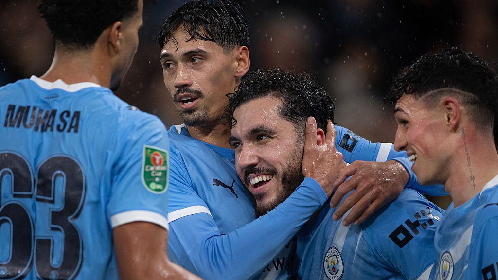 Rayan Cherki of Manchester City celebrates scoring with his teammates