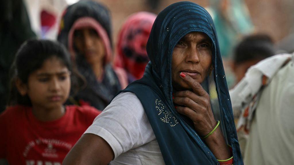 In this photograph taken on May 6, 2024, women from India's marginalised Dalit caste are pictured in Ayela village on the outskirts of Agra city. 