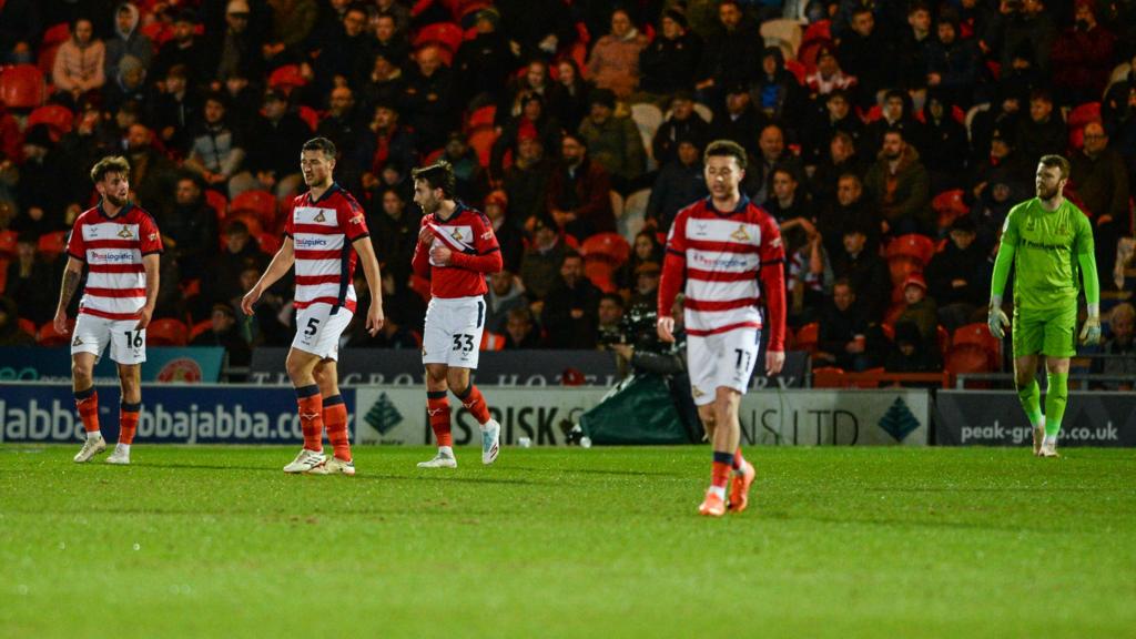 Doncaster Rovers players after conceding