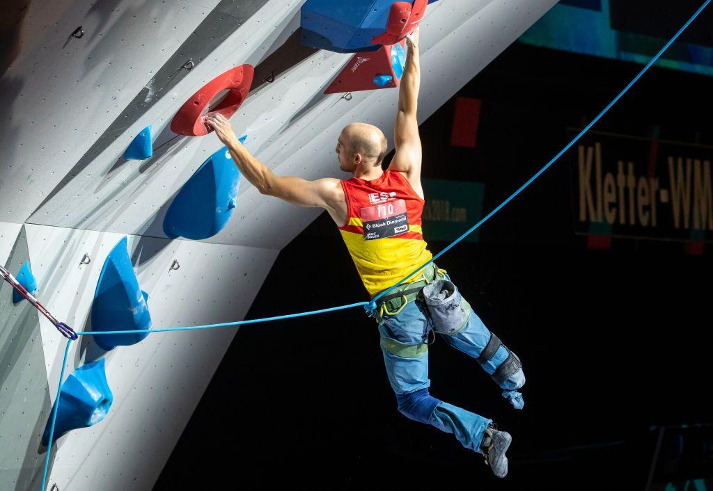 man on climbing wall. 