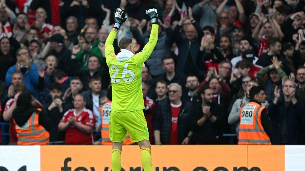 Matz Sels of Nottingham Forest acknowledges the fans