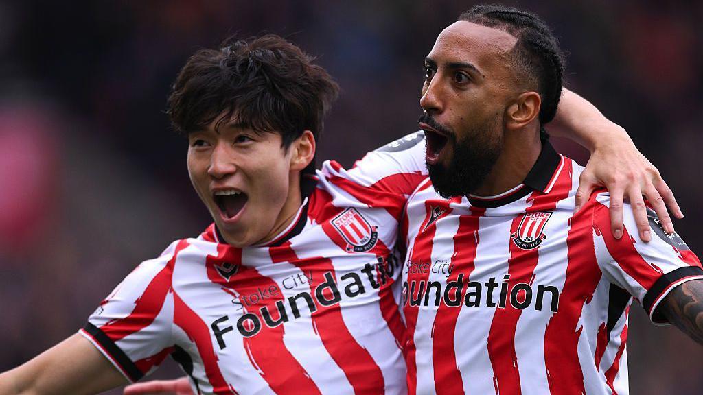 Sorba Thomas of Stoke City celebrates scoring his team's first goal with Bae Junho