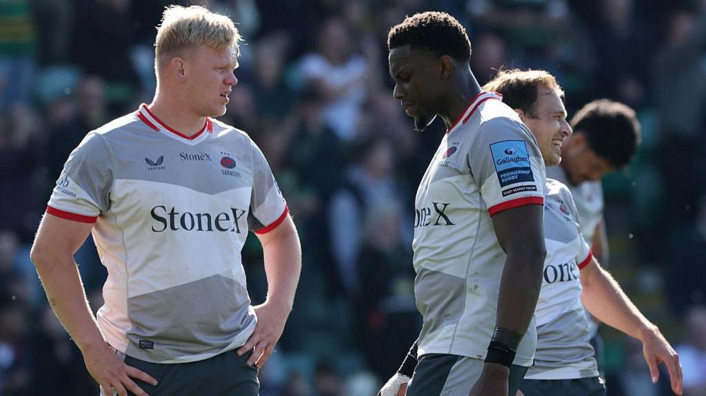 Hugh Tizard [left] and Maro Itoje [right] looking dejected after Saracens' defeat at Northampton Saints