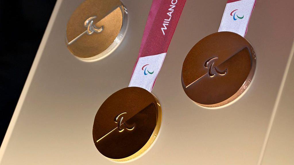 2026 Winter Paralympic Medals on display.