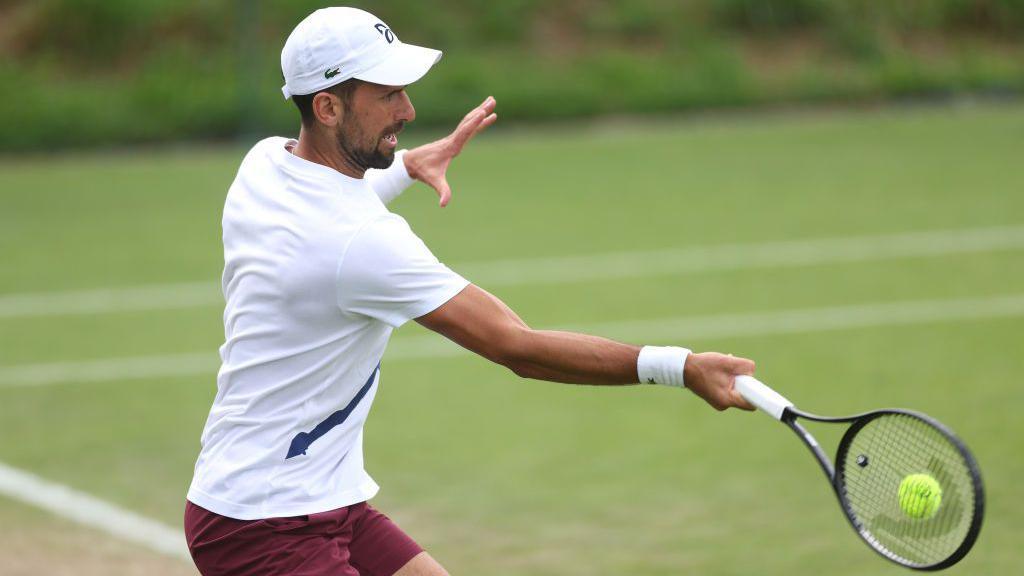 Novak Djokovic playing tennis