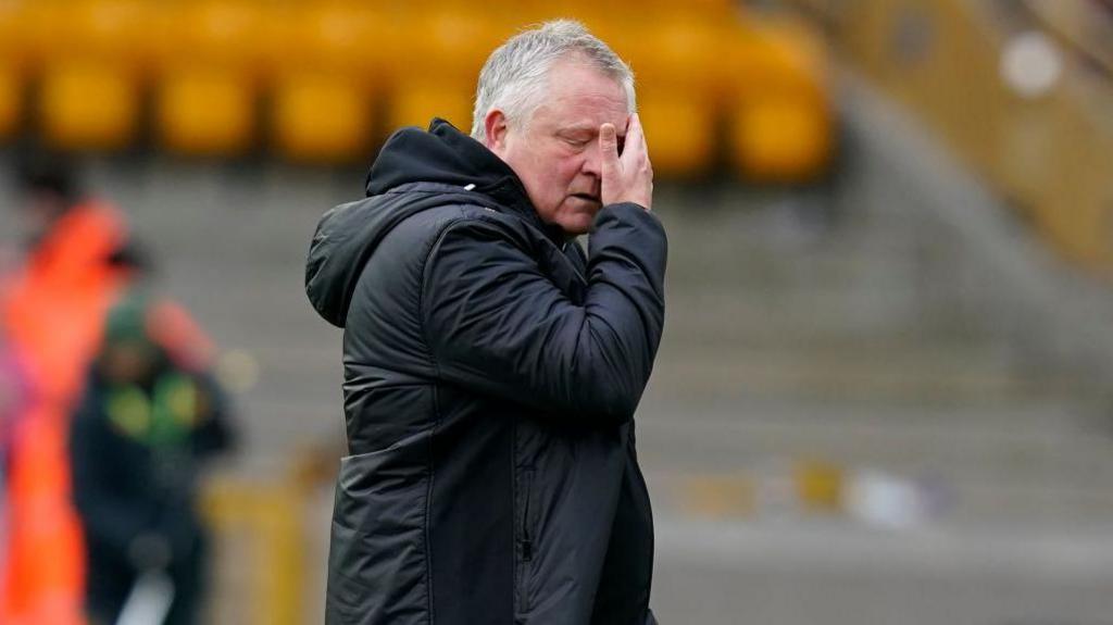  Chris Wilder manager of Sheffield United leaves the pitch frustrated