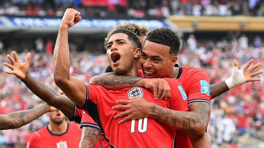 England players celebrating after Bellingham's goal against Panama.