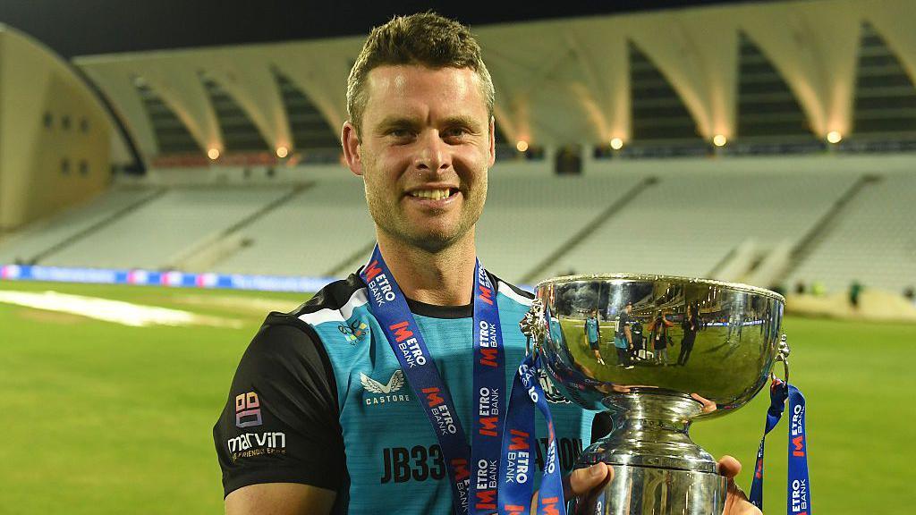 Jake Libby lifts the One-Day Cup at Trent Bridge after victory over Hampshire