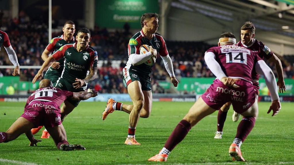 Adam Radwan races away for a try
