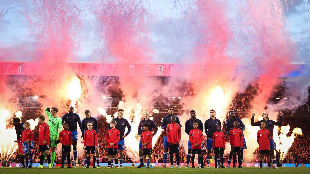 Crystal Palace fans in front of fireworks