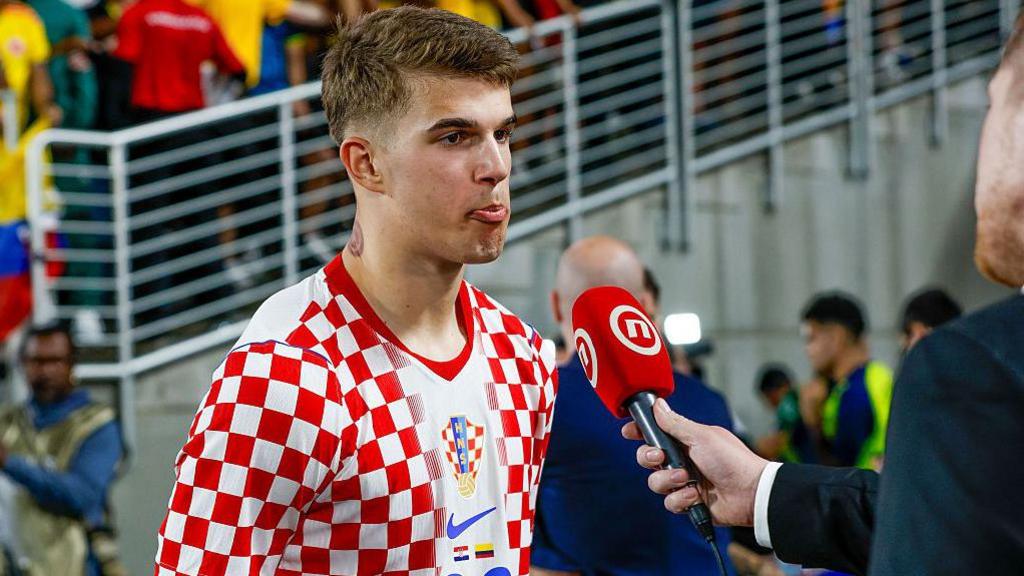 Luka Vuskovic speaks to the media after Croatia's 2-1 friendly win over Colombia in March