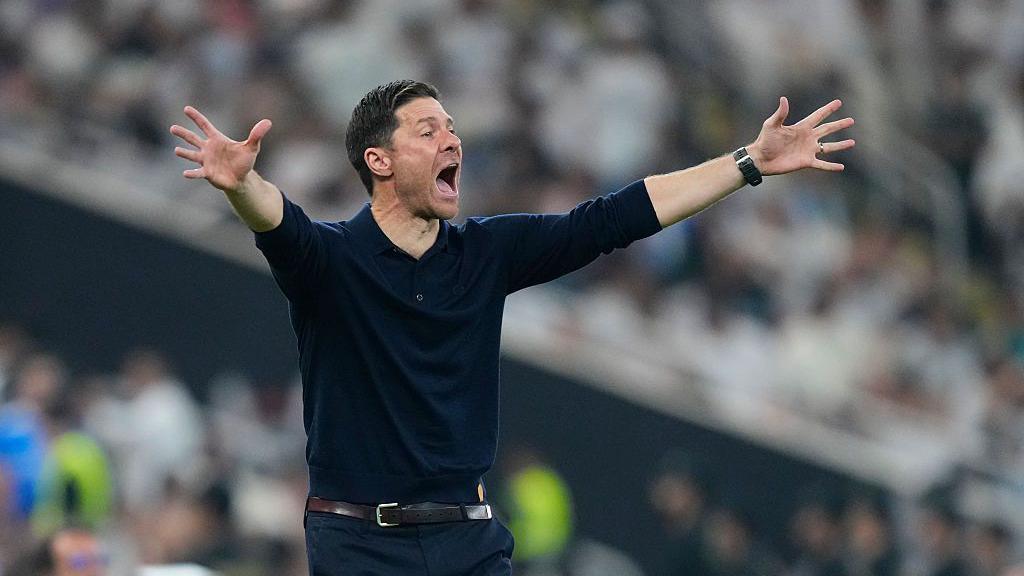 Xabi Alonso gesticulates on the touchline during Real Madrid's Super Cup semi-final against Atletico Madrid