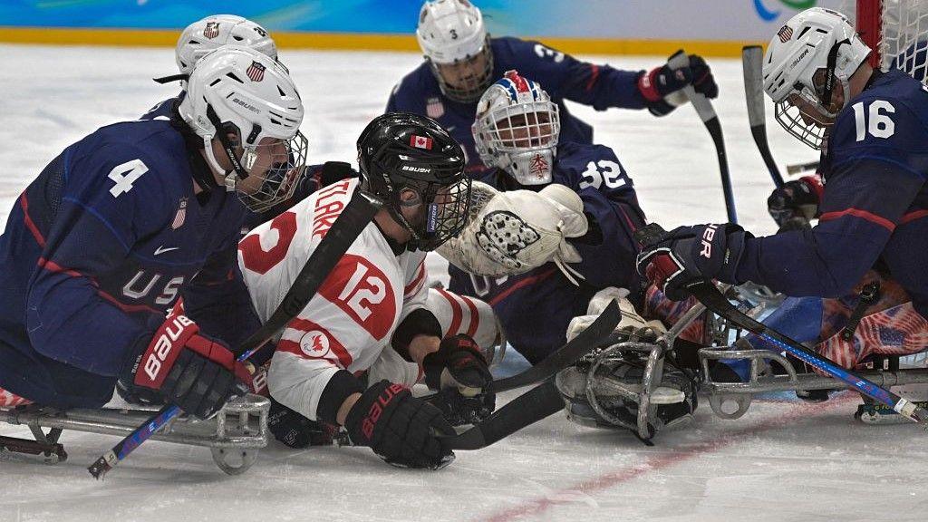 United States and Canada playing in the Beijing 2022 final