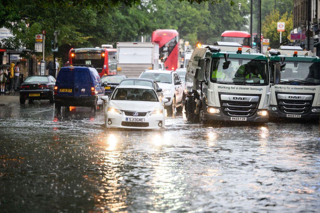 cars driving through water.