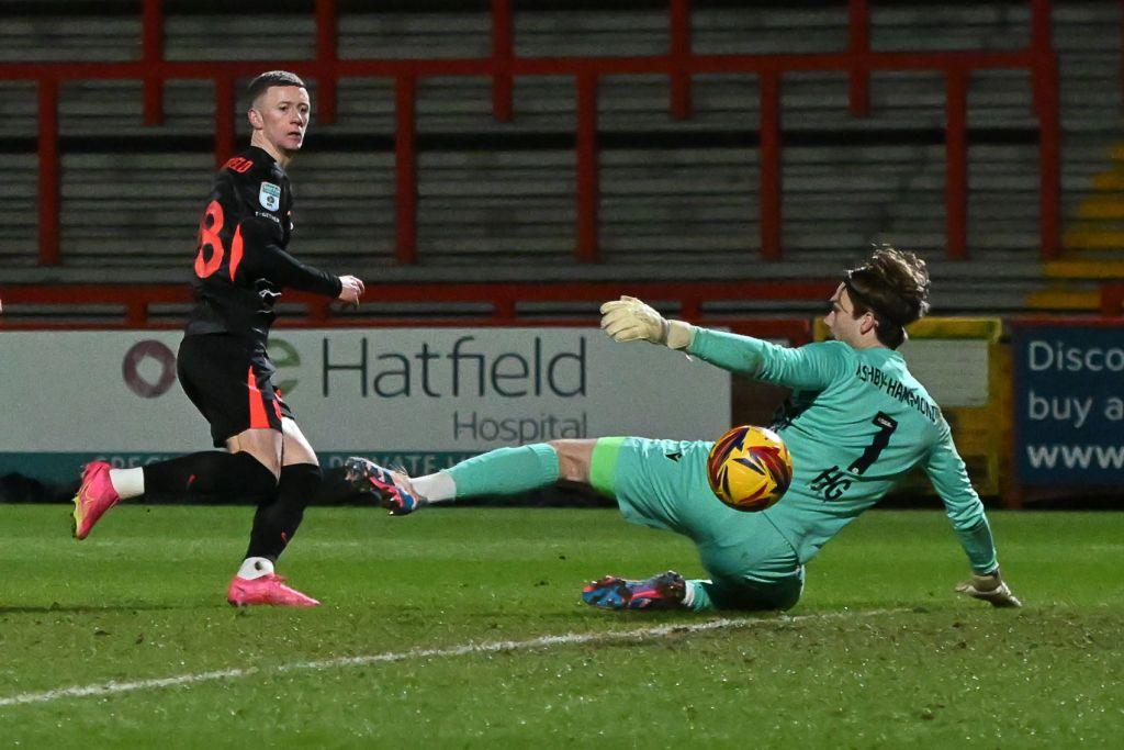 Jay Stansfield clips home Blues' quarter-final winner over Stevenage keeper Taye Ashby-Hammond