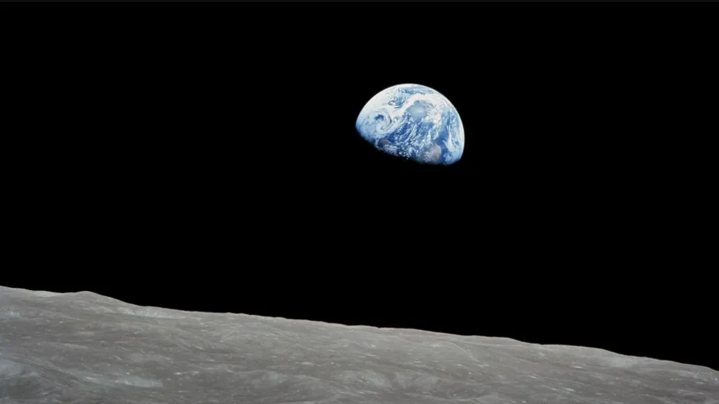 Earth peaking out behind the Moon in iconic photo