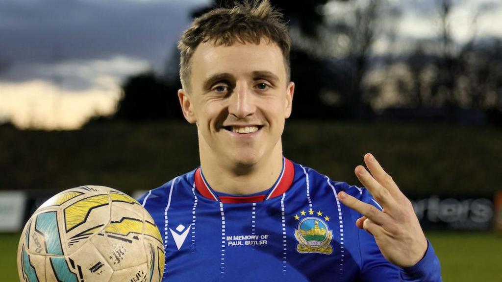 Joel Cooper pictured with the match ball after he scored a hat-trick in Linfield's recent win over Portadown