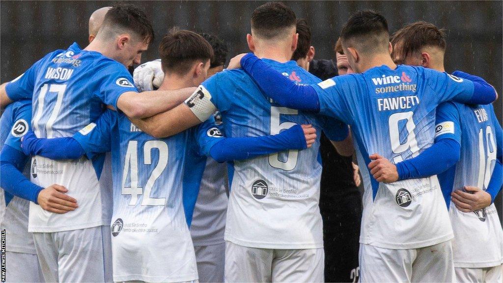 Haverfordwest County in a huddle before a game