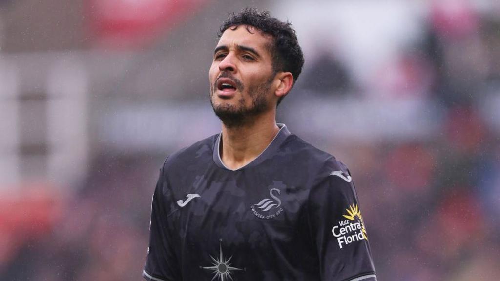 Kyle Naughton in action this season