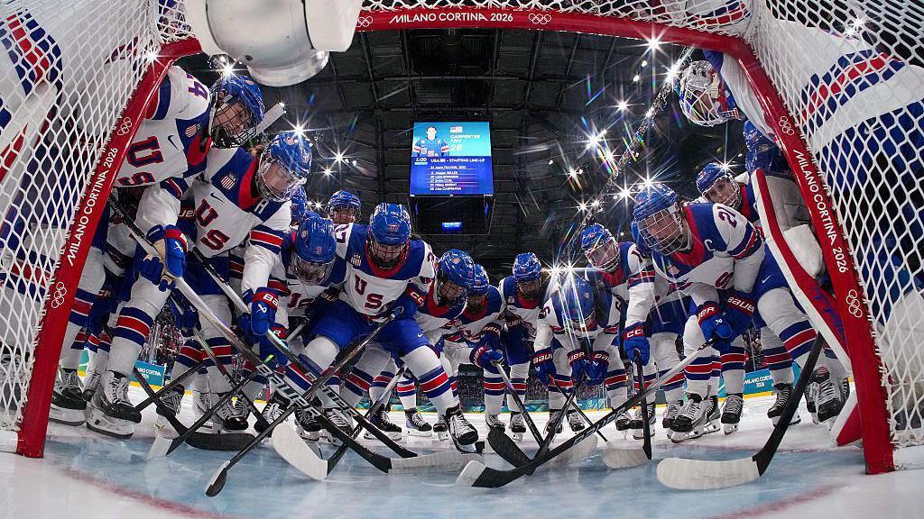 Team United States huddles up prior to the Women's Preliminary Group A match between United States and Canada