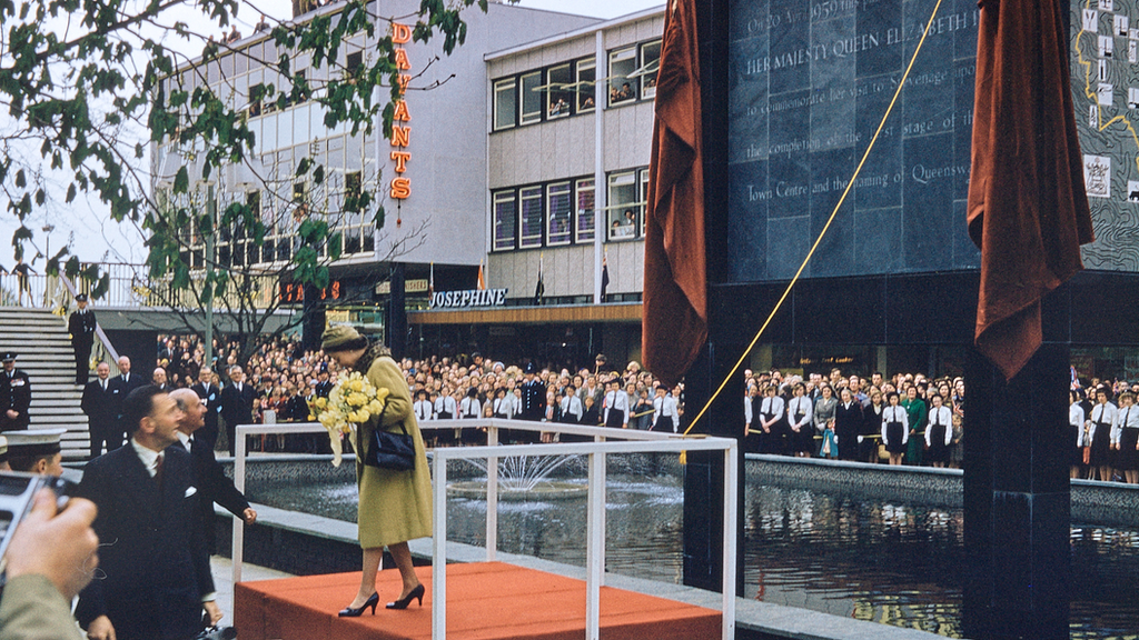 Queen Elizabeth II unveiling a plaque at Stevenage's clock tower