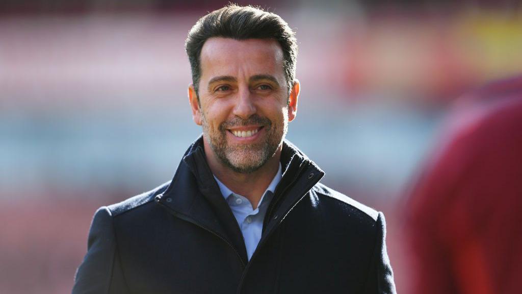 Edu smiling