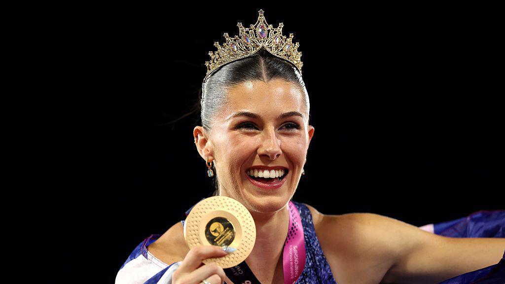 Amy Hunt with her gold medal.