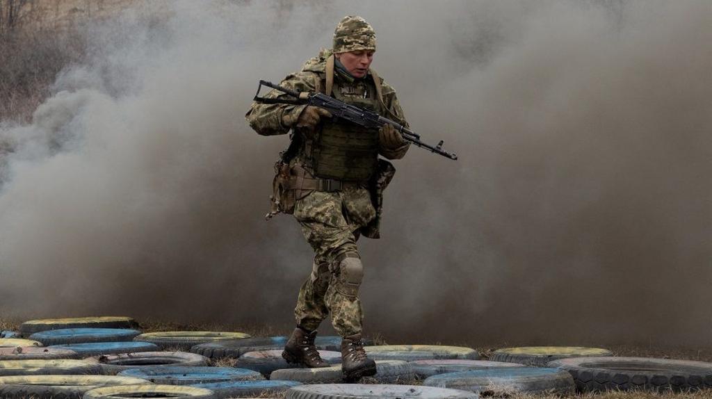 A female Ukrainian soldier taking part in a training drill