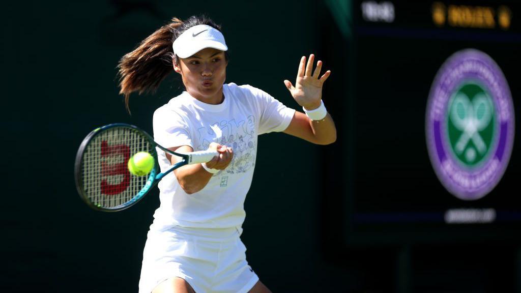 Emma Raducanu playing tennis